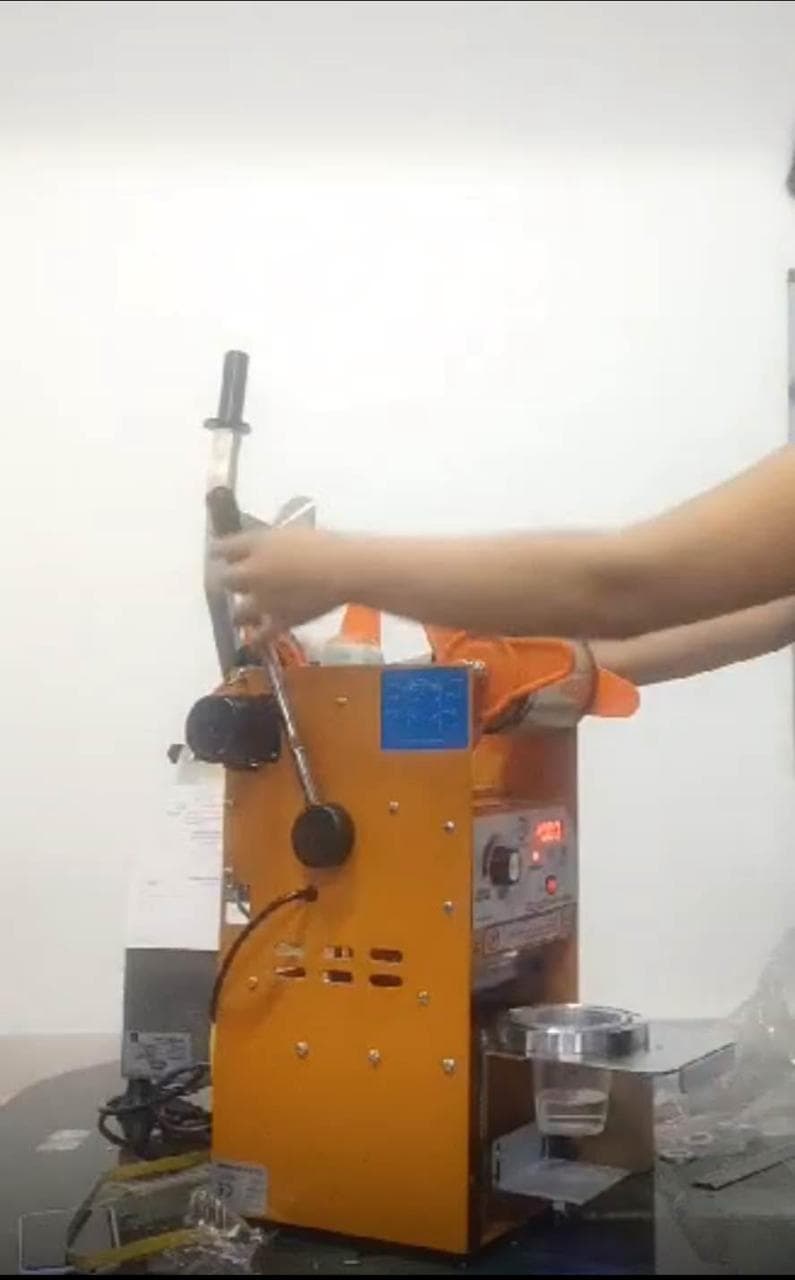 Máquina selladora de vasos semiautomática para negocios   Copiar